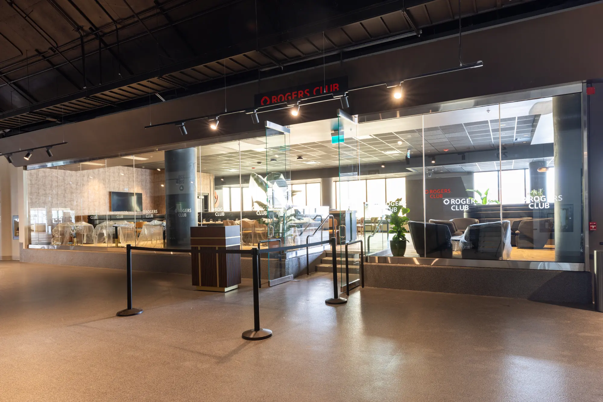 Modern cafe interior with a spacious counter and seating area.